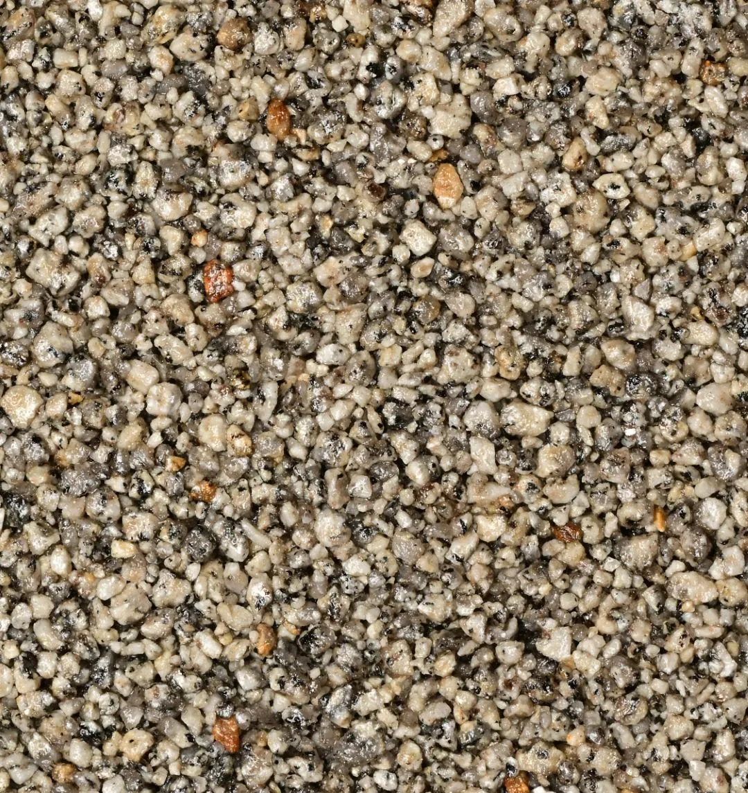 Kleurstaal harsgebonden grind Dapple Grey: Een lichte grijsbeige mix met fijne, donkere spikkels: een gespikkeld, natuurlijk grijs
